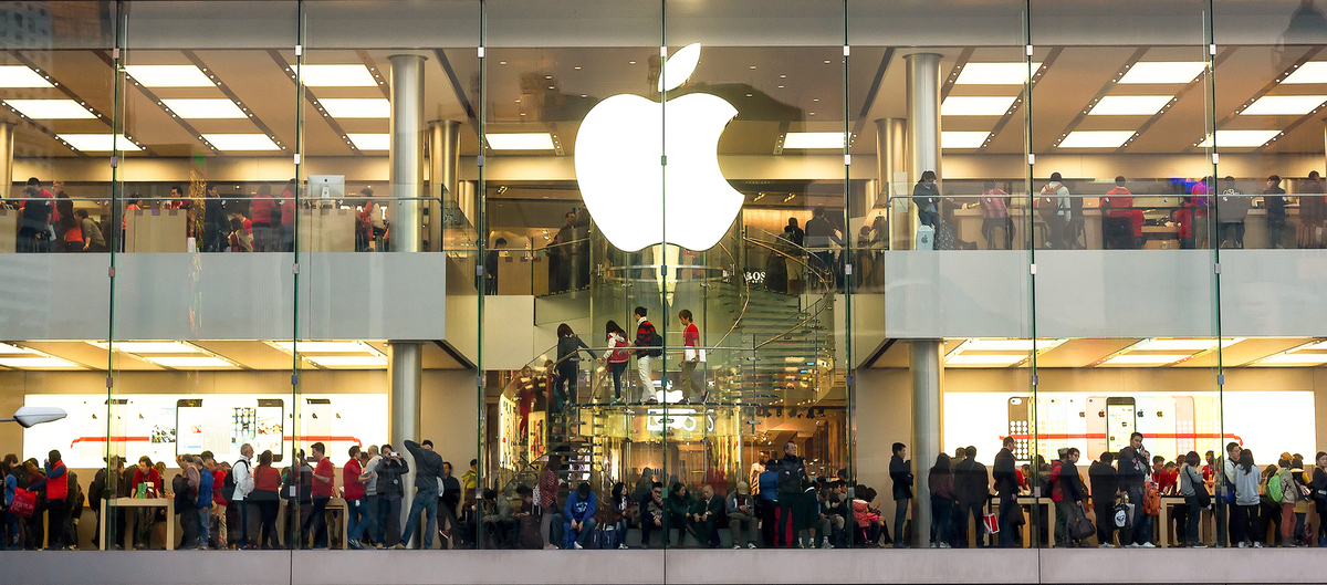 People make shopping in Apple store during  Christmas holidays