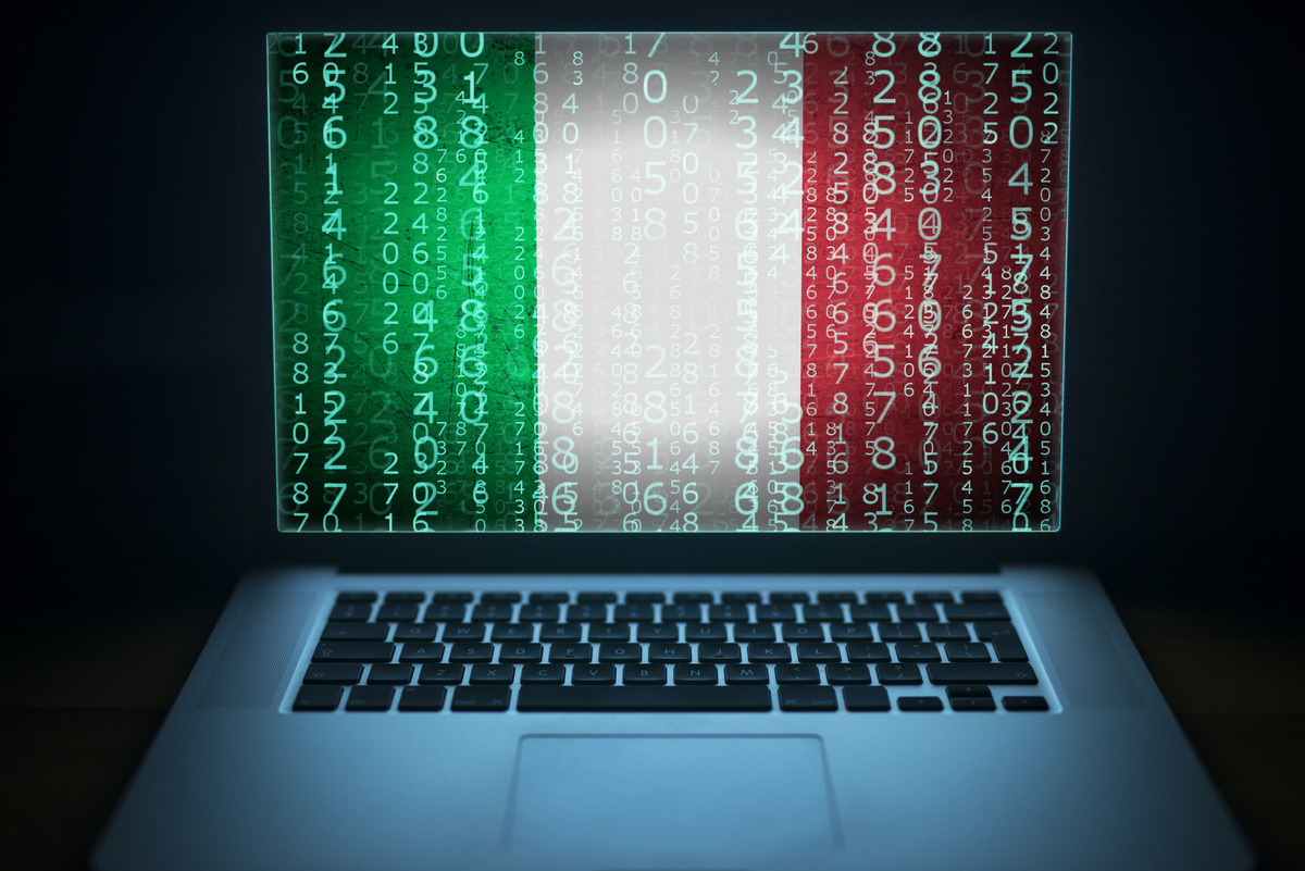 Internet and network security. Computer with binary computer code and Italian flag on the screen. Italian hacker.