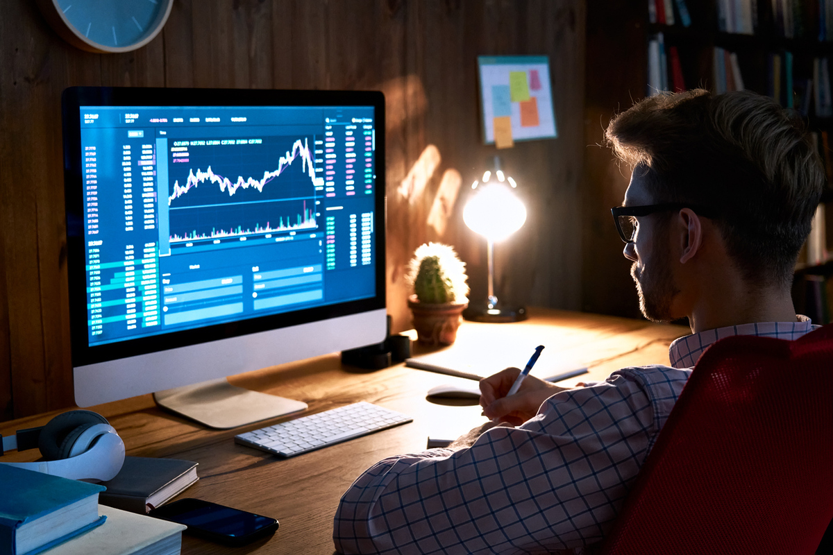 Business man stock exchange trader broker looking at pc computer screen, investor manager analyzing financial chart trading online investment data price crypto currency market graph, managing risks.