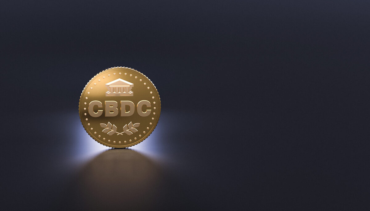 gold coin on gray background - CBDC