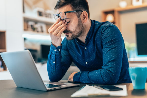Overworked and under-confident